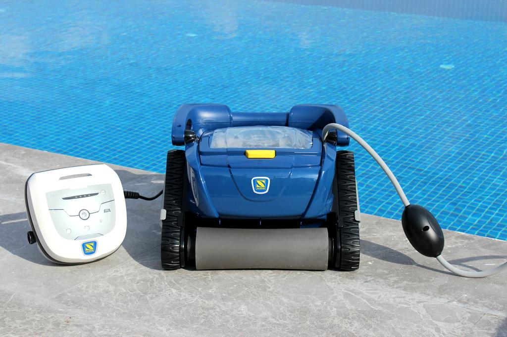 Happy family enjoying their crystal clear swimming pool after professional cleaning service